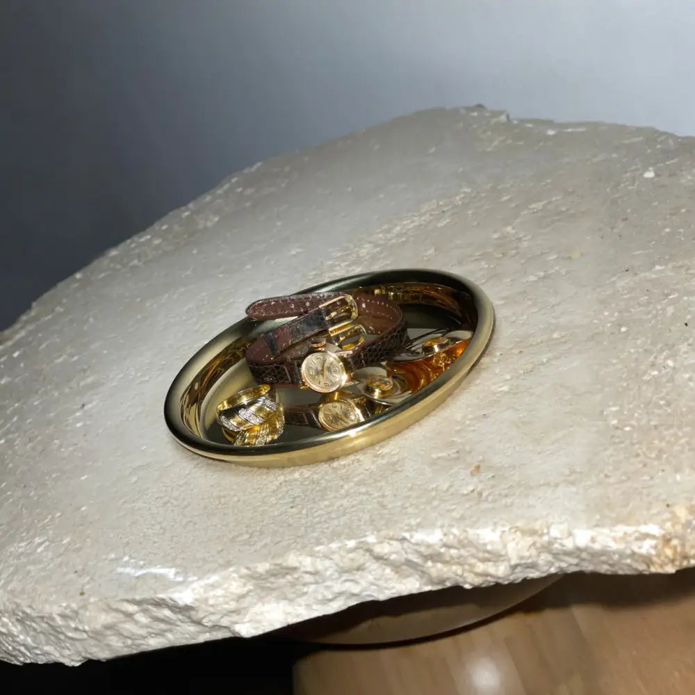 sottobicchiere ottone e orologi di lusso