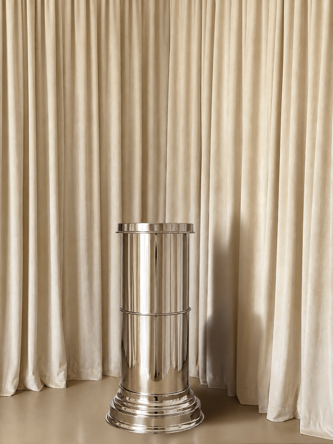 Contemporary Mirror-Polished Metal Display Column