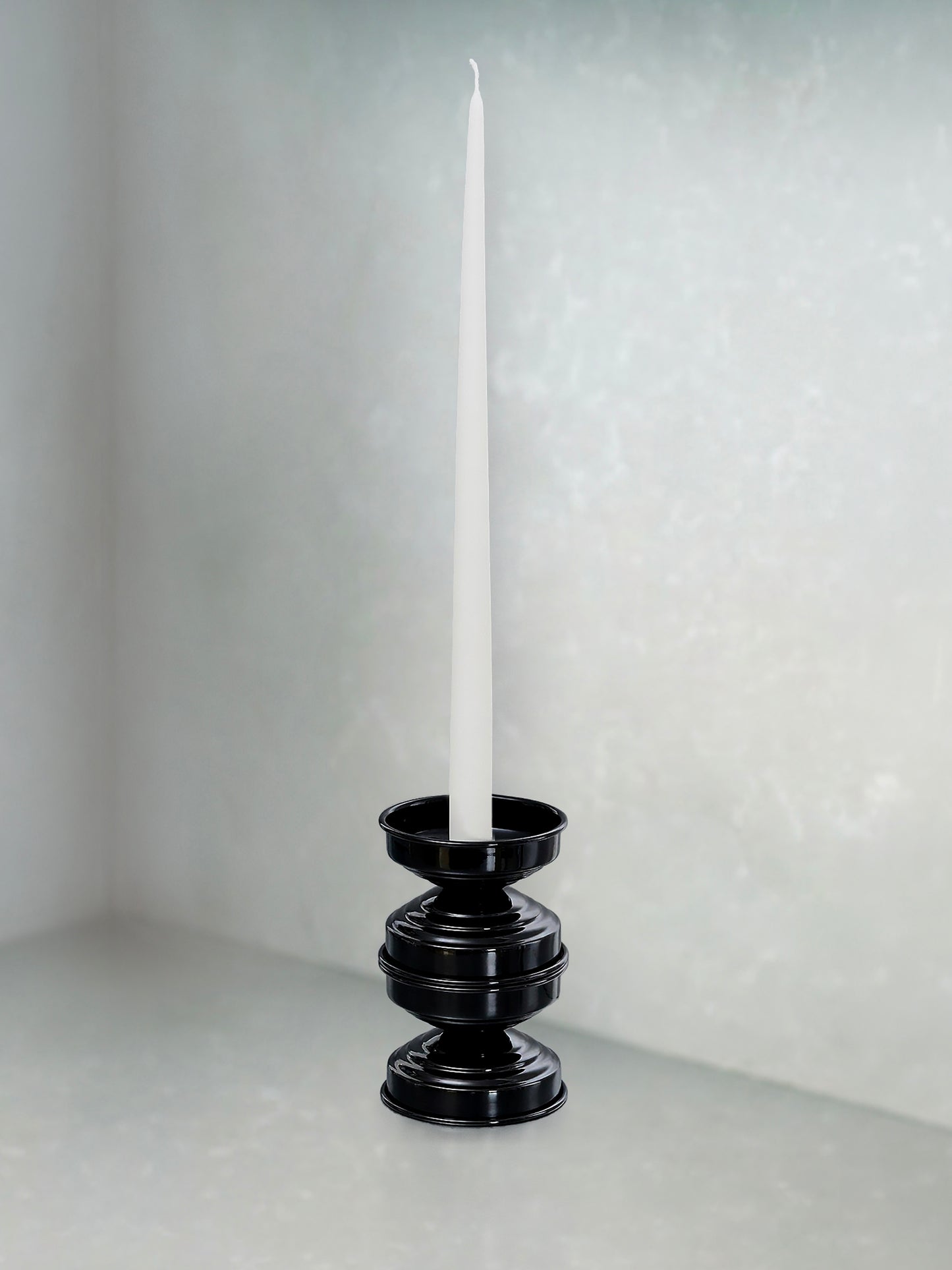 portacandele elegante in metallo nero lucido