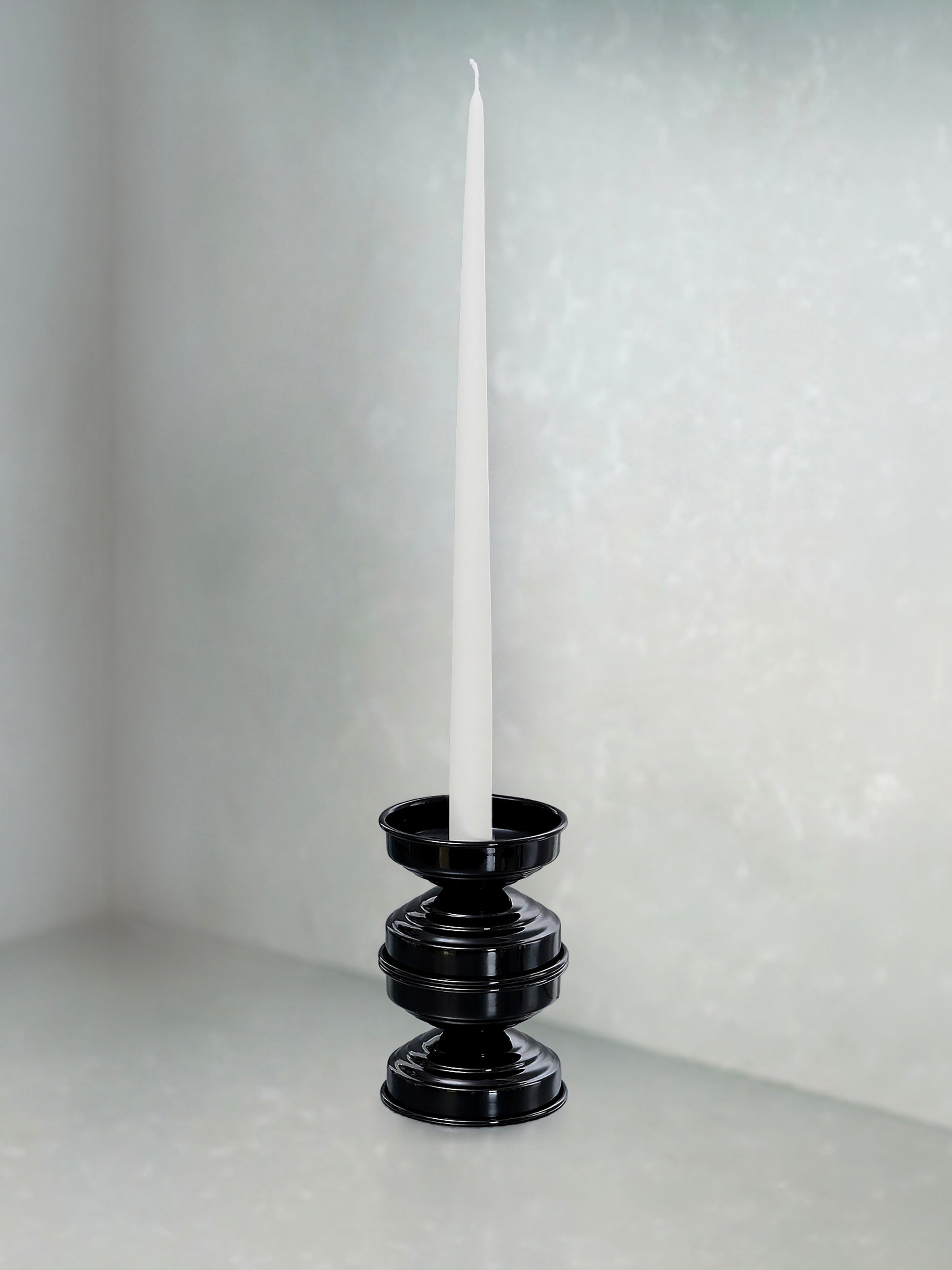 portacandele elegante in metallo nero lucido