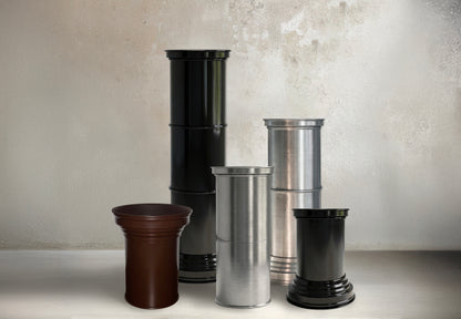 espositori colonnine colonne capitelli side table di design in metallo caspal