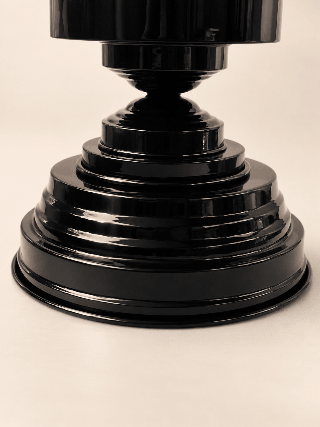 details of art deco amphora vase holder black glossy metal