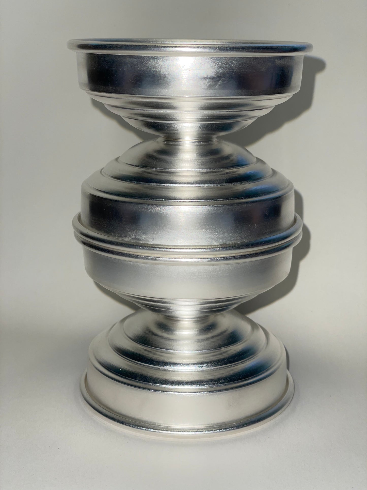 portacandele di design scultoreo placcato argento caspal
