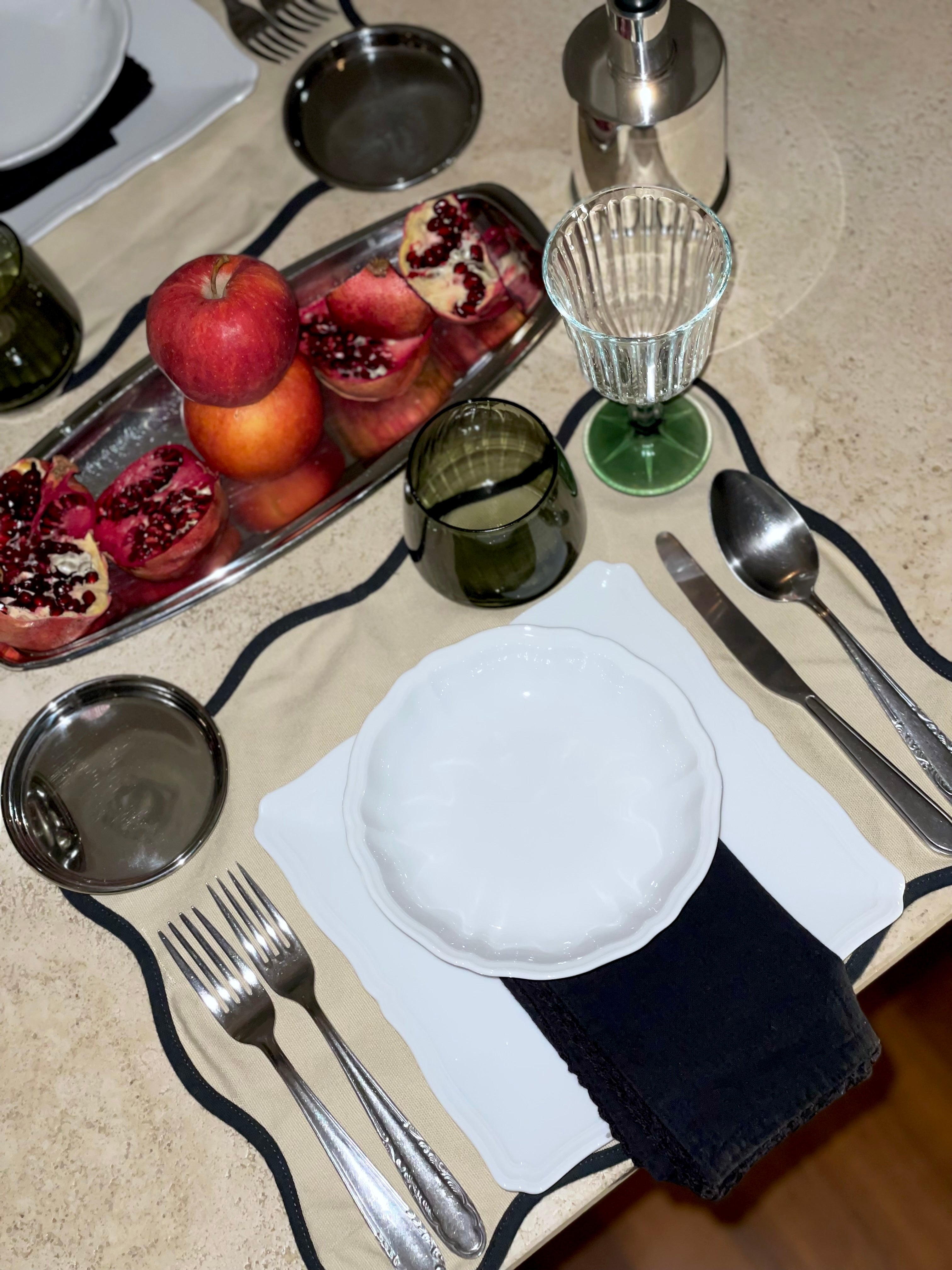 Elegant and minimal table styling in a contemporary restaurant setting designed for upscale dining experiences